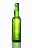 Green bottle of beer with drops of water