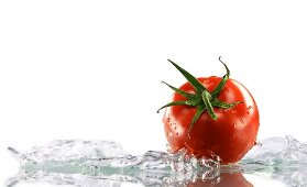 A tomato surrounded with water