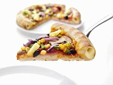 Ham and vegetable pizza with cheese-filled crust