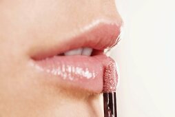 Applying lipstick, Close up