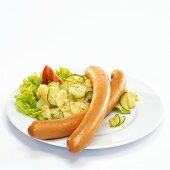 Wiener with potato salad, close-up, elevated view