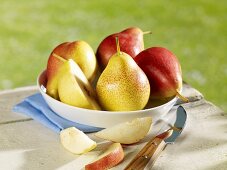 Several pears in dish