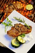 Barbecued lamb chop with cucumber and garlic & olive cream