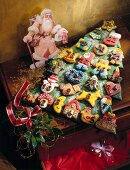 Baked Christmas cake as Advent calendar on wooden box
