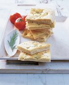 Focaccia pita bread with rosemary and tomatoes