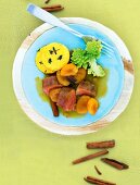 Lamb with cinnamon, apricot sauce and romanesco broccoli on plate