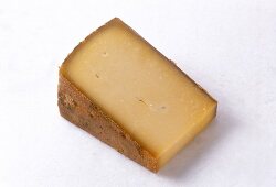 Close-up of gruyere cheese on white background