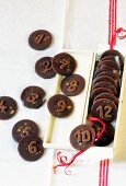 Chocolate peppermints decorated with numbers as an Advent calendar