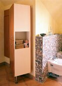 Interior of bathroom with wooden shelf and wardrobe