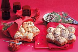 Fresh baked rolls with Christmas jam on red background
