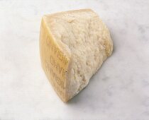 Parmesan cheese on white background