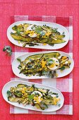 Goats cream cheese with herbs and vinaigrette on zucchini in three plates