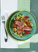 Tagliatelle with lamb fillet in bowl