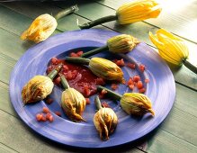 Stuffed courgette flowers on plate