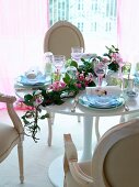 Set Easter table with flower tendril