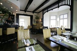 Interior of restaurant with laid tables in Germany