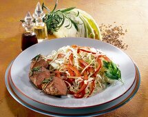 Lamb fillet with coleslaw on plate