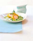 Souffle scallops with pea risotto on plate