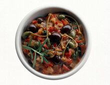 Siracusana pasta sauce with olives and peppers in bowl