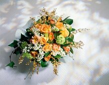 Bouquet of roses, ranunculus, poppy and white lilac on white background
