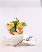 Close-up of Asian egg salad in glass bowl