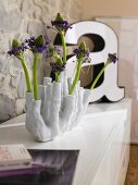 White flower vase on table