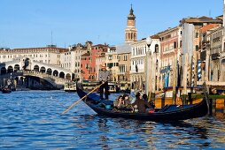 People travelling in Gondola at Grand Canal in Venice, Italy