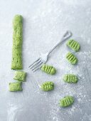 Spinach gnocchi and fork