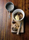 Mixed fruit cubes with butter in bowl