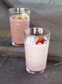 Pink and white drink in two glasses