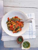 Bowls with ratatouille and pesto