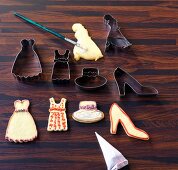 Various cookie cutter and cookies with decoration, glaze and brush