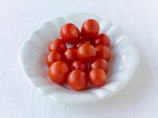 Small cherry Pachino tomatoes in bowl