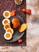 Cinnamon and orange shortbread sandwich biscuits and lemon-flower-honey madeleines