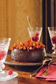 Chocolate blancmange with caramel nuts on serving dish