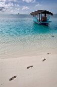 Traditional boat Dhoni in sea in Dhigufinolhu island, Maldives