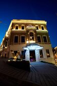 Illuminated facade of W hotel at night, Istanbul, Turkey