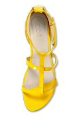 Close-up of yellow sandal on white background