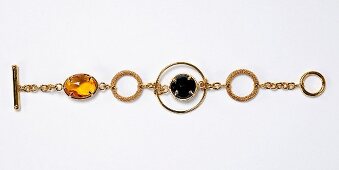Freisteller: Armband gold, Quarzsteine schwarz und gelb