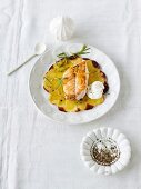 Potato carpaccio with rosefish fillet, creme fraiche and rosemary