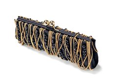 Baguette clutch with gold chains on white background