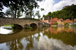 View of bridge, Naab river and medieval village of Kallmunz, Bavaria, Germany