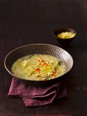 White cabbage soup with bulgur, apple and rosemary