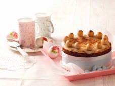 Simnel cake and glazed mini-fruit cake on serving dish