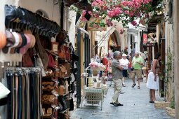 Tourist shopping in the alley of Rethimnon, Greece