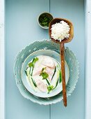 Salmon in coconut sauce with rice (Asia)