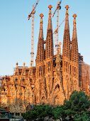 View of Sagrada Familia facade with blue sky in Barcelona, Spain