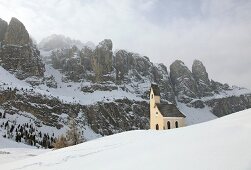 View of Chapel at the Gardena pass in front of the Sella Group, South Tyrol, Italy