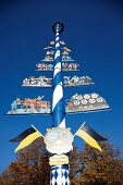 Low angle view of Maypole at the Viktualienmarkt, Munich, Germany