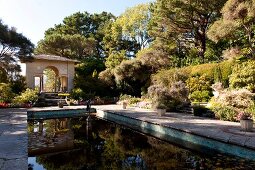 View of Ilnacullin Italian Garden surrounded with trees, Ireland, UK